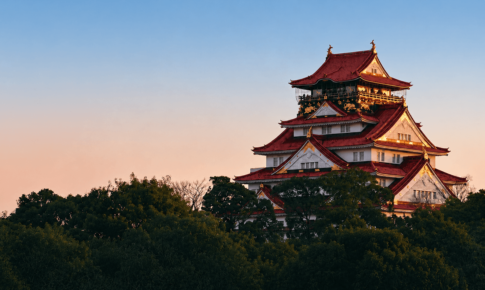 Osaka Castle glowing at sunset